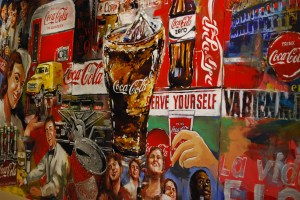 A collection of Coca Cola advertisements from around the world